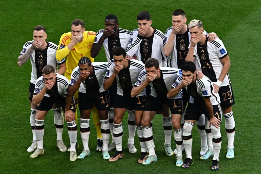 German national team cover their mouth against lgbtq ban