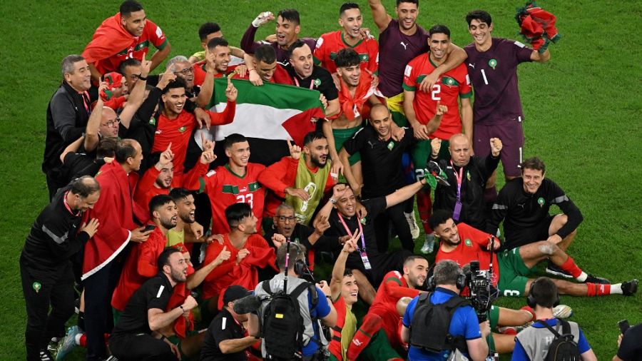 morroco team celebrates with palestine flag