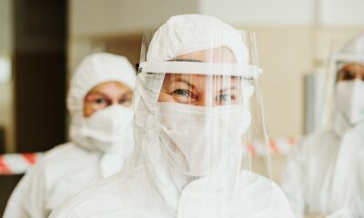 A health care worker in a face shield.