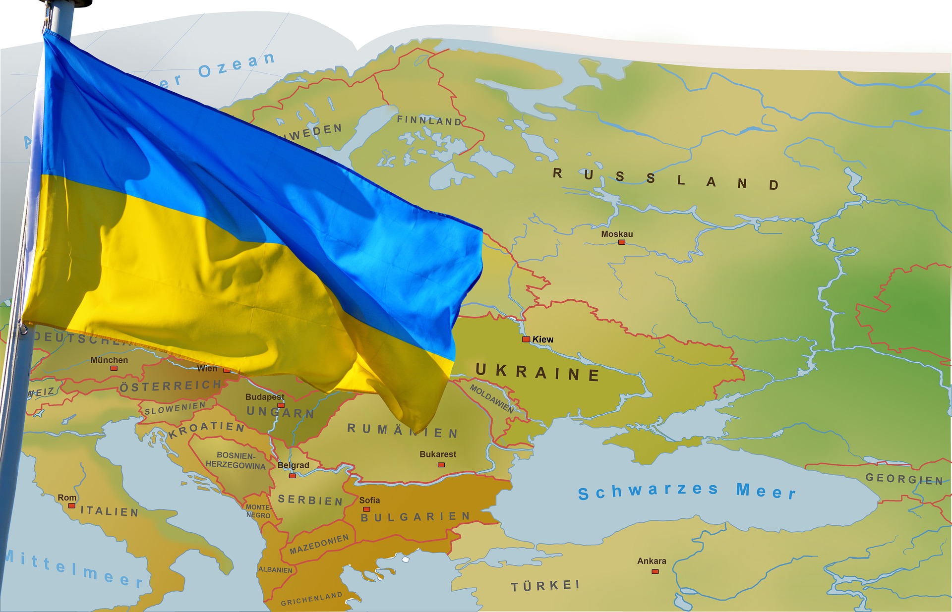 Ukraine flag over the map of world.