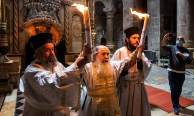 christians celebrating holy fire ceremony