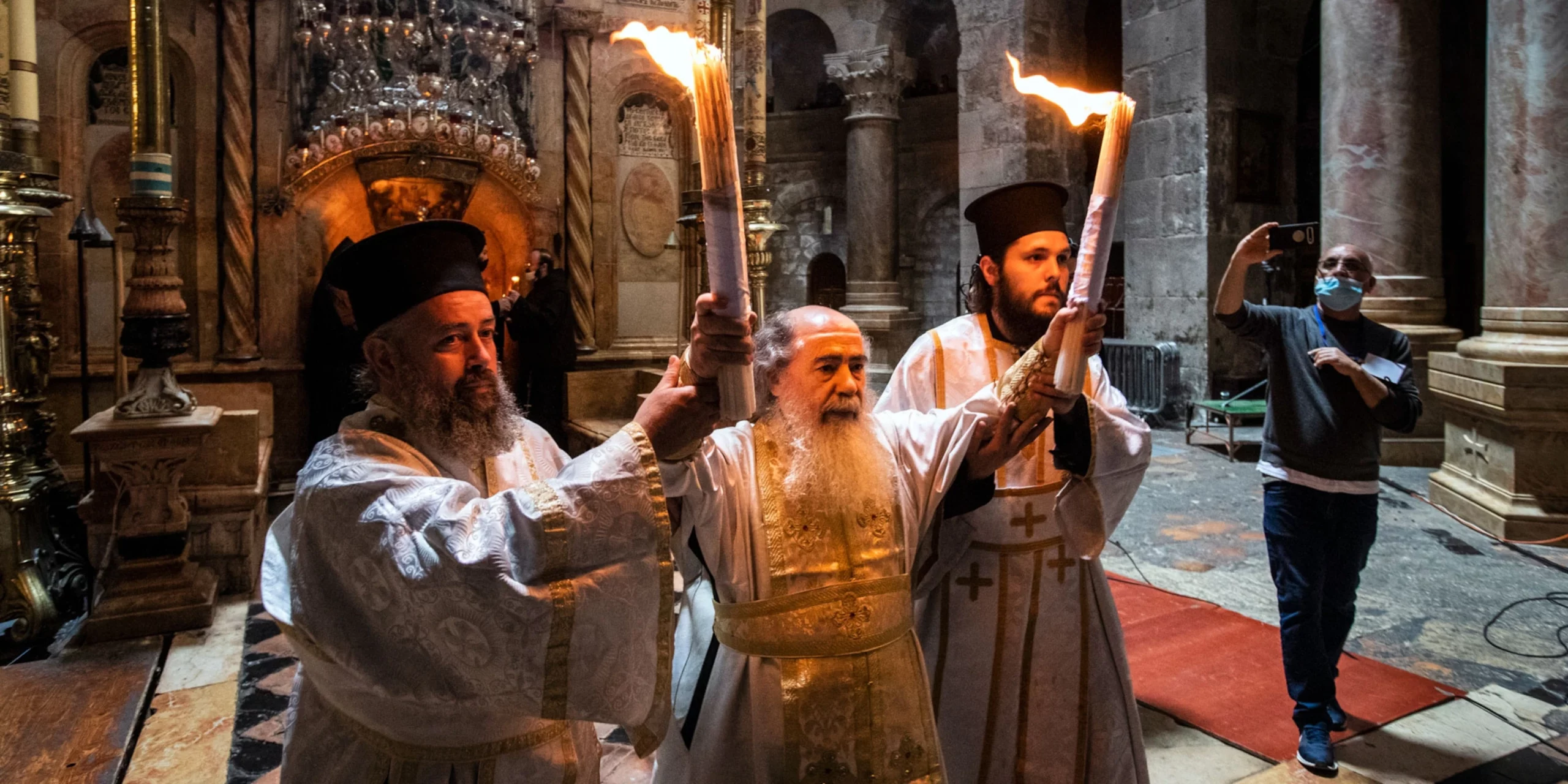 christians celebrating holy fire ceremony