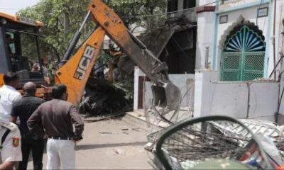 A JCB demolished the main gate of a mosque in Jahangirpuri, Delhi.