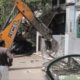 A JCB demolished the main gate of a mosque in Jahangirpuri, Delhi.